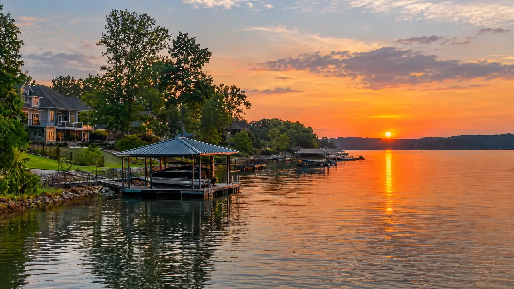 Lakeside homes with docks on Old Hickory Lake at sunset