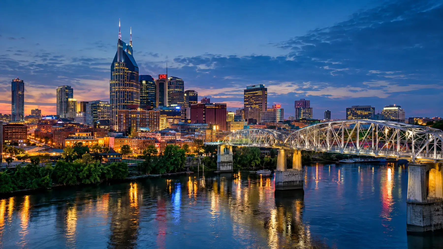 Nashville skyline across the Cumberland River at blue hour